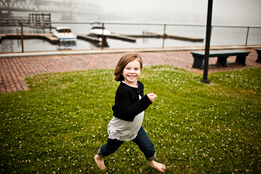 kid runs through grass