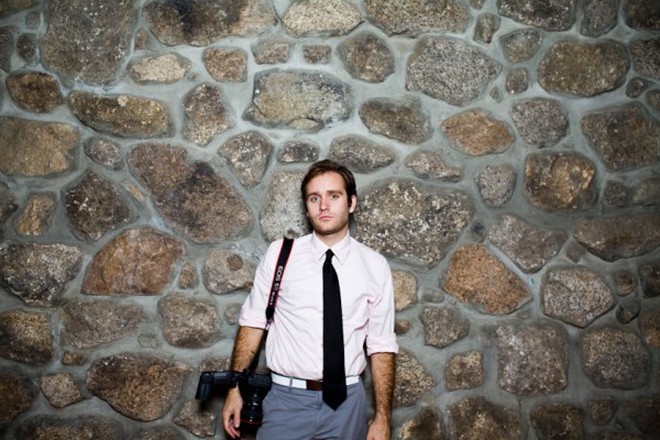 some weird guy that we are pretty sure was crashing the wedding, posing as a photographer.