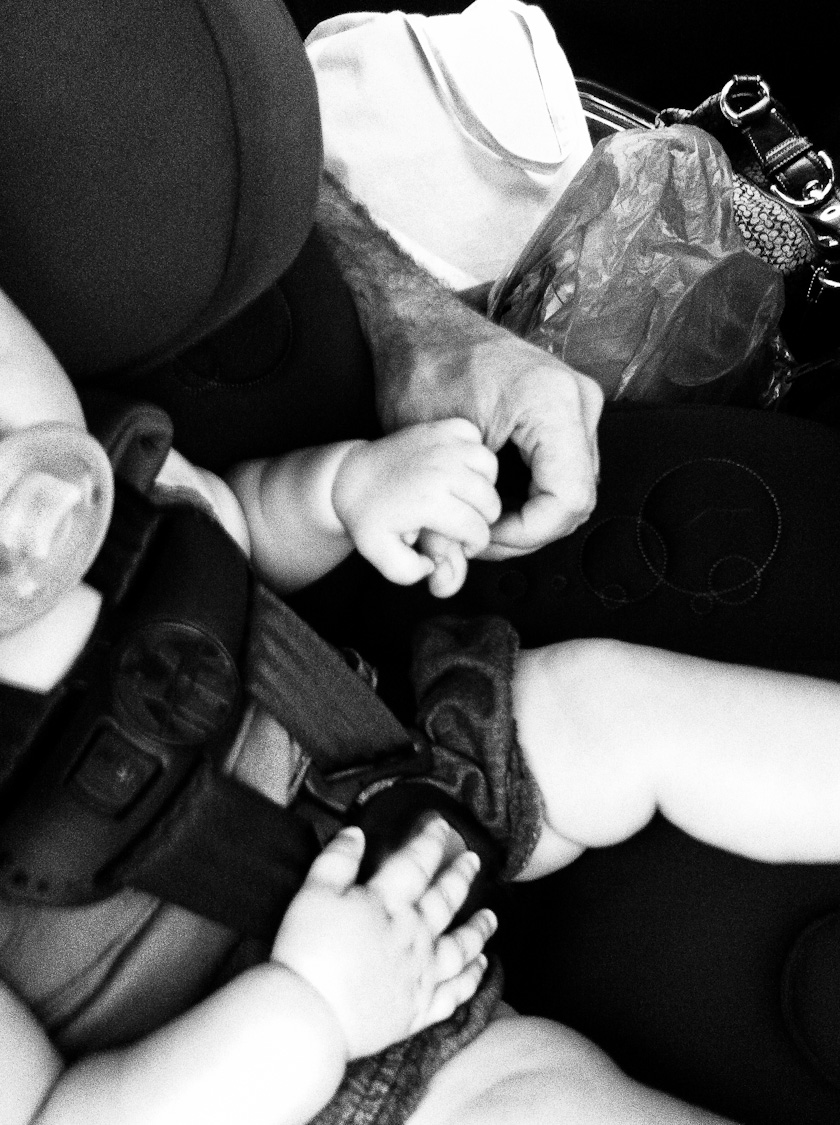 showing dad some love in the new car seat.